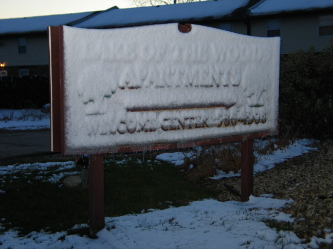 Image of Snow on Lake of the Woods Apartments sign