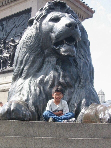Image of Scott in Front of
One of the Four Lions in Trafalgar Square