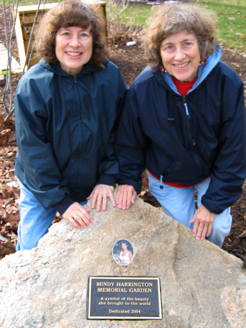 Image of Mary Jane and Jan in back of Memorial Stone for Mindy Harrington